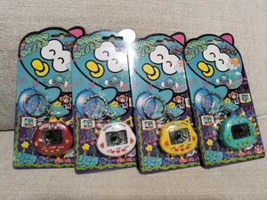 Dinkie Dino Electronic Virtual Pet RakuRaku Dinokun Lot - Picture 1 of 3