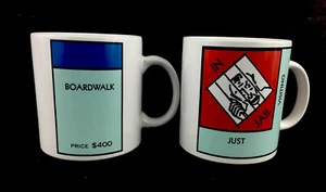 2 tazas de café Monopoly para juegos de mesa en la cárcel/visitar la cárcel paseo marítimo lugar 12 oz - Imagen 1 de 7