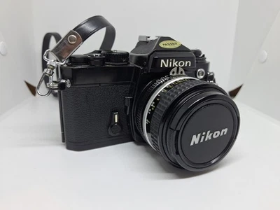 COMO NUEVO Con Correa Nikon FE SLR 35mm Cámara Fotográfica Ai 50mm f1.4 Lente ¡Excelente Estado! Foto 1 de 4