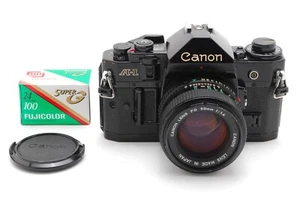 Messgerät funktioniert [Top+5] Canon AE-1 Program schwarz FD Neu FD 50mm f/1.4 Japan - Bild 1 von 10