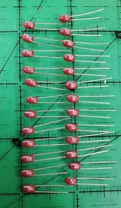 Capacitors Tantalum Radial ECS-F1AE226K Panasonic 22uF 10v Red  25pcs - Picture 1 of 1