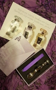 Younique's Wax Seal Bundle. Includes purple candle and younique stamp - Picture 1 of 3