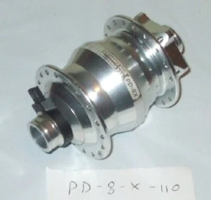Shutter-Precision (SP) PD-8X Dynamo Hub, Silver / 6V 3W, 15x110mm, 36°, Disc - Picture 1 of 3