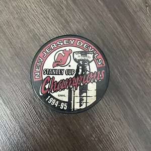 NHL Official Hockey Puck New Jersey Devils 1994-95 Champs - Picture 1 of 2