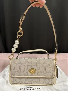 Coach Signature Mini Schultertasche mit Perlenkette Kauf - Bild 1 von 5
