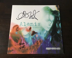 Disco vinile firmato ALANIS MORISSETTE JAGGED LITTLE PILL + nuovo Ltd. LP trasparente + PROOF - Foto 1 di 6