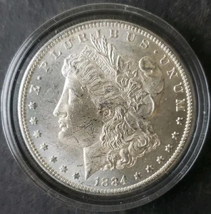 1884 O $1 Morgan Silver Dollar in a Capsule - Photo 1/2
