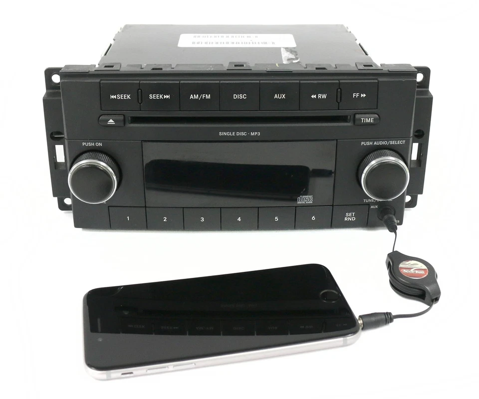 Jeep Commander Dodge AM FM 2008-2009 radio reproductor de CD con Aux P68021159AC RES Foto 1 de 4