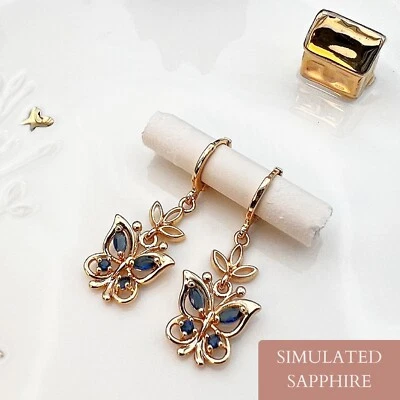Pendientes mariposa colgantes de zafiro simulado rellenos de oro real de 18 quilates Foto 1 de 4