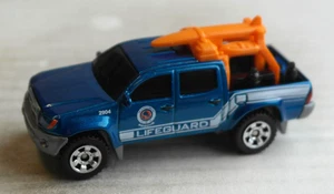 Matchbox Toyota Tacoma Pickup blaumetallic LIFEGUARD Multipack Exclusive MBX - Picture 1 of 4