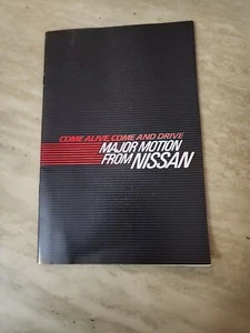 1984 Nissan car range advertising booklet -- - Picture 1 of 2