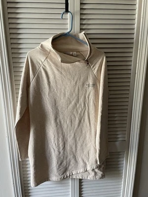 Top mediano Earth Yoga para mujer, polar elástico orgánico sostenible manga larga Foto 1 de 4