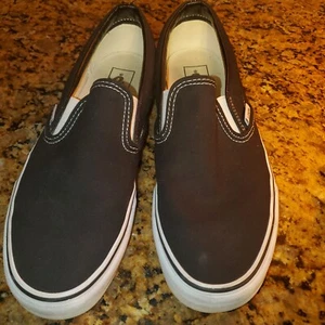 Vans Slipper schwarz-weiß Off the Wall Herrengröße 8,5 Damengröße 10  - Bild 1 von 10