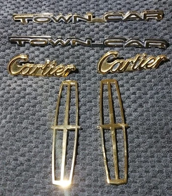 Juego de 6 emblemas dorados Lincoln Town Car Cartier 98-02 OEM originales usados Foto 1 de 4