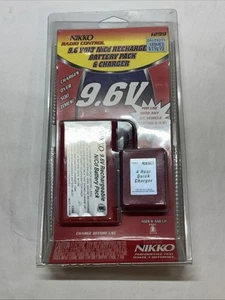BATERÍA RECARGABLE Y CARGADOR NIKKO 1299 RADIO CONTROL 9.6 V NiCd NUEVO - Imagen 1 de 2
