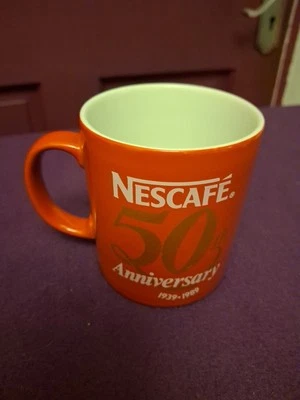 Taza pequeña café té 50 aniversario 1939-1989 roja blanca apta para microondas Nescafé Foto 1 de 4