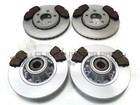 VAUXHALL VIVARO FRONT AND REAR BRAKE DISCS PADS ABS RING FITTED WHEEL BEARINGS
