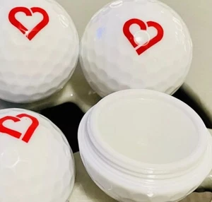 (2) ECCO White Golf Ball Globe Moisturizer With Red. Heart Chapstick Lip Balm - Picture 1 of 3