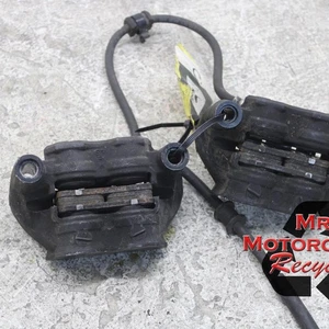09-16 JUEGO DE PINZAS DE FRENO DELANTERAS DERECHA IZQUIERDA SUZUKI GSXR1000 GSXR 1000 OEM PAR O3 - Imagen 1 de 9