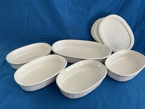 CORNING WARE FRENCH WHITE F-7-B 1L & (X4) F-15-B 0,475L Piatti ovali con 3 coperchi - Foto 1 di 6