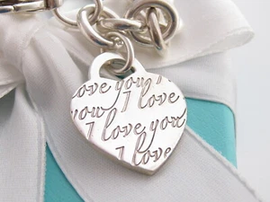 "AUTÉNTICO BRAZALETE CON ENCANTO DE CORAZÓN TIFFANY & CO PLATEADO I LOVE YOU 8" - Imagen 1 de 6