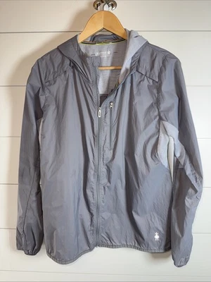 Chaqueta cortavientos Smartwool gris para mujer talla L nailon PhD ultra ligera con capucha Foto 1 de 4