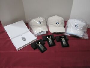 BMW LIFESTYLE HATS  (3), BMW KEYCHAINS (3), BMW KEY FOB FOR USB PORT (1)   