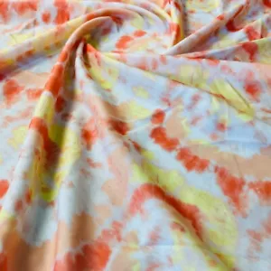Tie Dye Yellow and Coral Print Nylon Spandex Fabric 4 Way Stretch By Yard - Picture 1 of 5