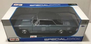 1965 Pontiac GTO - Maisto - 1/18 Diecast Model Car - BLUE w/ BLACK Hard Top - Picture 1 of 12