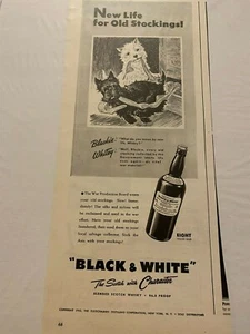 Vintage 1943 B & W Whiskey Scottie Dogs Playing With Stockings ad - Picture 1 of 1