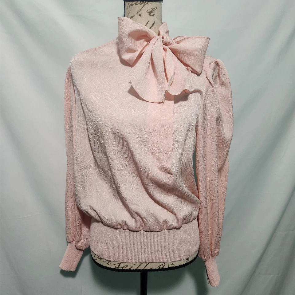Blusa romántica vintage Castleberry Neiman Marcus rosa suave envolvente con lazo. Talla 10. Foto 1 de 4