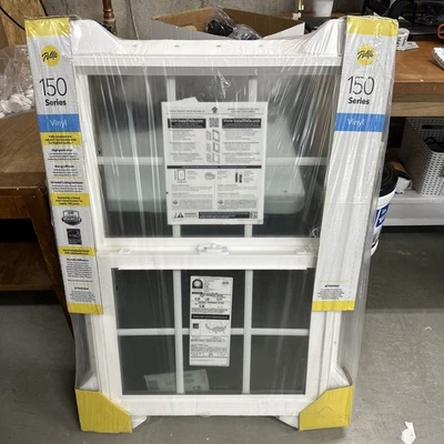 Pella 150 Series 23.5" x 35.5" Blanco Exterior Doble Ventana Colgada con Rejillas Pantalla Foto 1 de 4