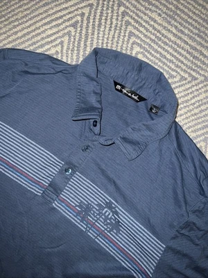 Camisa Polo Travis Mathew Palm Tree Rayas Wanakah CC - Azul - Grande Foto 1 de 4