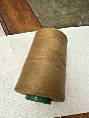 Dark Beige Perma Core Serger Sewing Thread - used - about 85% left of 6000 yds - Image 1 of 4