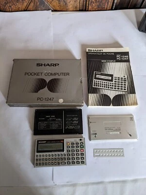 sharp pc 1247 calculator calculatrice s'allume - Photo 1/4