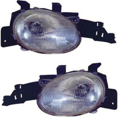 For 1995-1999  Plymouth Neon Pair Headlight Driver & Passenger CH2502103 - Image 1 of 3
