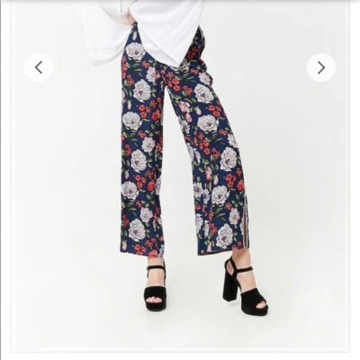 Pantalones fluidos florales azules rojos blancos pierna ancha con aberturas blancos ribetes laterales L Foto 1 de 4