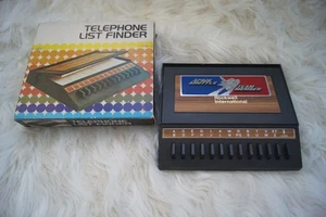 Accessorio scrivania retrò vintage lista telefonica cercatore anni 70 finto legno pulsante - Foto 1 di 6
