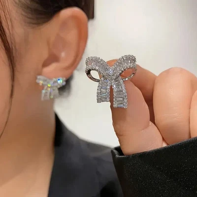 2Ct Baguette Cut Lab Created Diamond Bow Stud Earrings In 14K White Gold Finish - Image 1 of 4