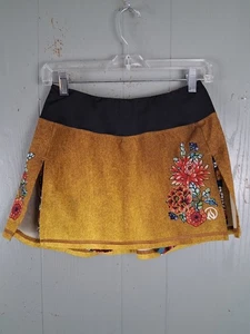 Falda corta para correr INKnBURN para mujer talla 4 amarilla tatuaje floral natación yoga abertura absorbente - Imagen 1 de 8