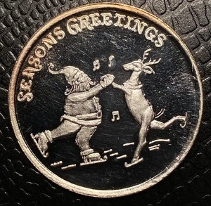 Gravierbare 1 Oz Holiday Vibes Santa & Rentier mit Musik Schlittschuhlaufen .999 Silbermünze - Bild 1 von 8