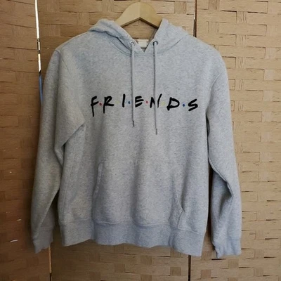 Sudadera con capucha forrada de franela H&M Friends para mujer talla mediana gris claro Foto 1 de 4