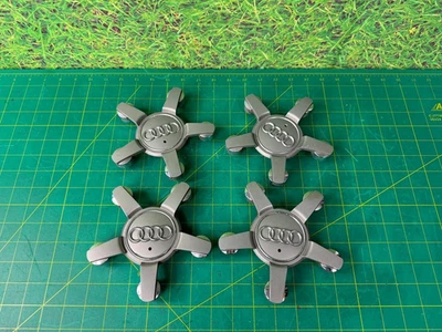 Оригинальный б/у набор из 4 центральных колпаков для колес Audi Q7 2007-2015 годов выпуска 4L0601165D - Изображение 1 из 4