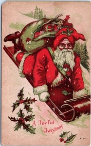 Antique Christmas Postcard Santa Riding Sled w/ Toy Bag Head First No Reindeer - Picture 1 of 2