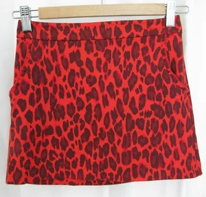 180249 Girl's 128 8 8Y KATE SPADE Orange Purple Leopard Stretch Knit Short Skirt - Picture 1 of 4