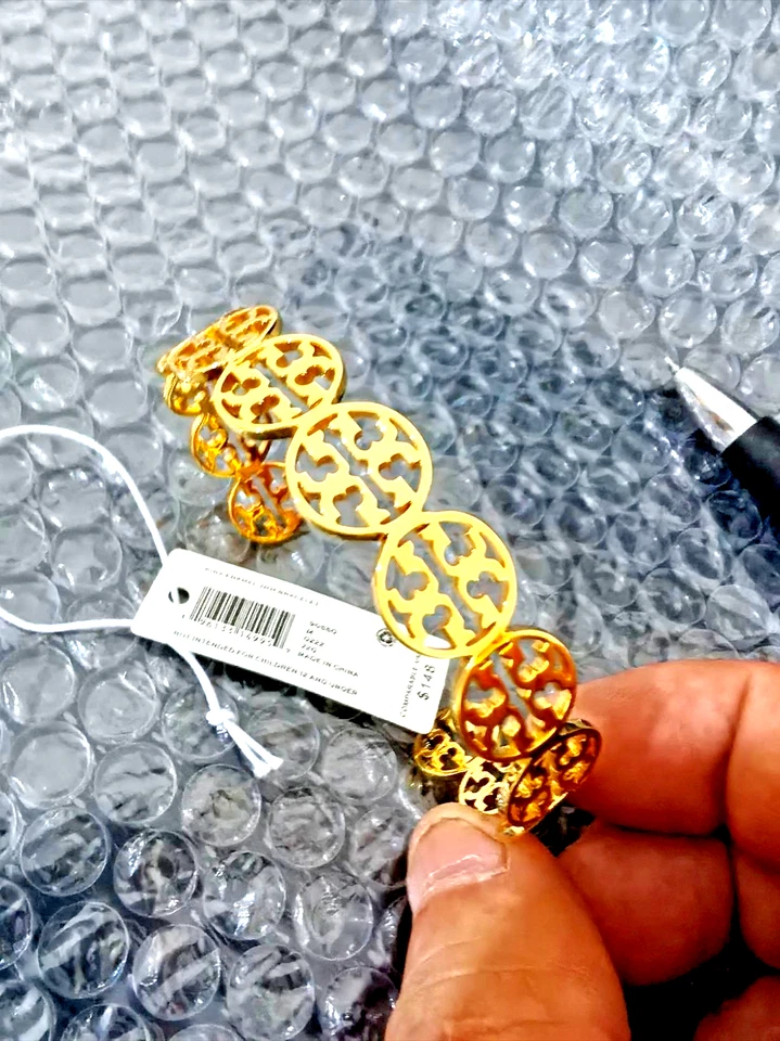 Nova pulseira de ouro com logotipo oco Tory Burch TB - Imagem 1 de 4