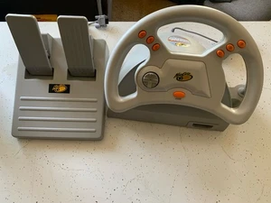Juego de volante y pedales Sega Dreamcast Mad Catz Dream Wheel - Imagen 1 de 13