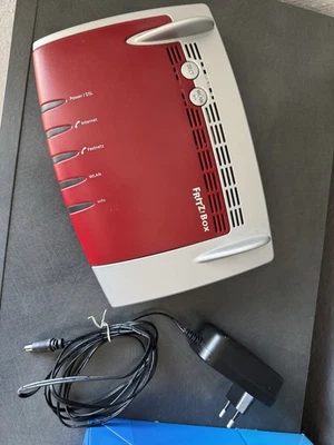 FRITZ!Box 7490 WLAN-Router Rot/Silber Inkl. Netzteil und OVP. Guter Zustand - Bild 1 von 3