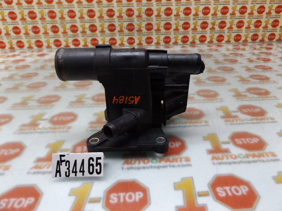 Ford Focus 2003-2007 termostato salida refrigerante crossover 6S4Z-8K556-A OEM Foto 1 de 4