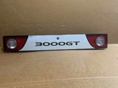 1994 - 1998 Mitsubishi 3000GT painel de lanterna traseira central vermelho prata fabricante de equipamento original - Imagem 1 de 4